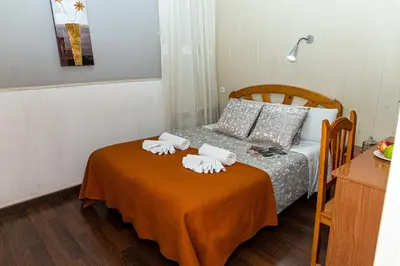 Cama o camas de una habitación en New Go Inn
