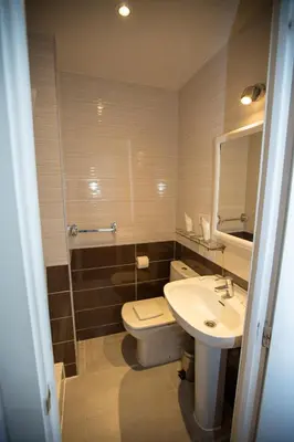 Un baño de New Go Inn