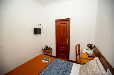 Cama o camas de una habitación en New Go Inn