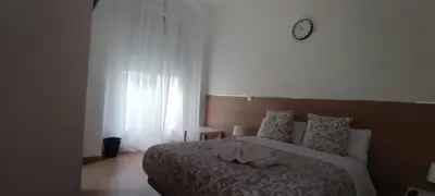 Cama o camas de una habitación en New Go Inn