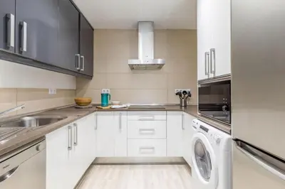 Una cocina o zona de cocina en Spacious flat puerta del sol