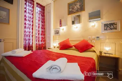 Cama o camas de una habitación en Hostal La Fontana