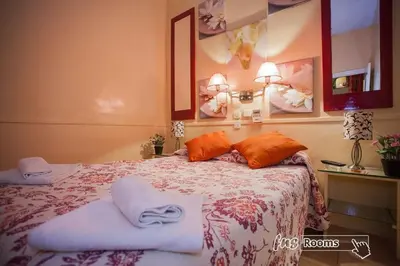 Cama o camas de una habitación en Hostal La Fontana