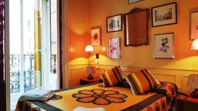Cama o camas de una habitación en Hostal La Fontana