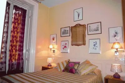 Cama o camas de una habitación en Hostal La Fontana