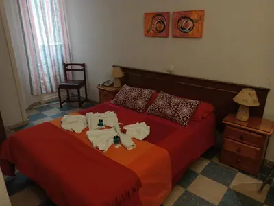 Cama o camas de una habitación en Hostal Continental