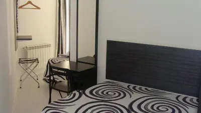 Cama o camas de una habitación en Hostal JQ Madrid 1