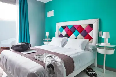 Cama o camas de una habitación en Hotel Freedom