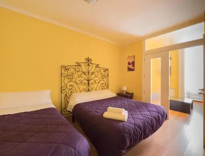 Cama o camas de una habitación en Pensión Apolo XI