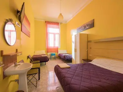 Cama o camas de una habitación en Pensión Apolo XI