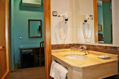 Un baño de Hostal Victoria II