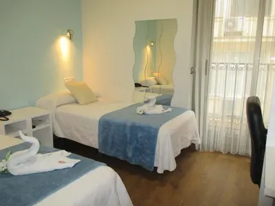 Cama o camas de una habitación en Madrid City Rooms