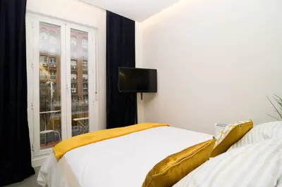 Cama o camas de una habitación en Modern Studio in Embajadores Street by Batuecas