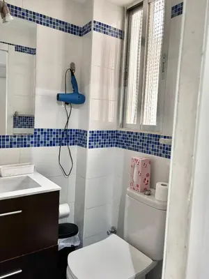 Un baño de Centro Madrid Rio - Monederos D