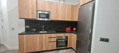 Una cocina o zona de cocina en Apartamentos Cava Baja