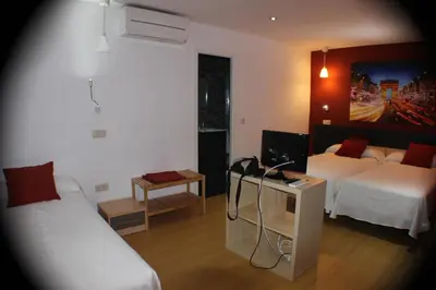 Cama o camas de una habitación en Hostal Falfes
