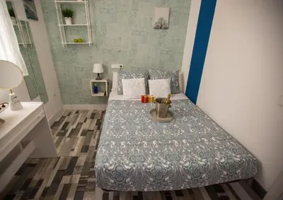 Cama o camas de una habitación en Fuencarral Adeco