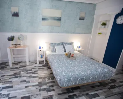 Cama o camas de una habitación en Fuencarral Adeco