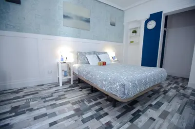 Cama o camas de una habitación en Fuencarral Adeco