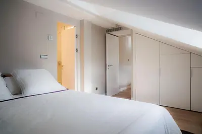 Cama o camas de una habitación en U-Sense Madrid Santa Ana