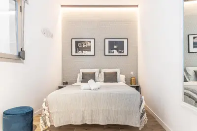 Cama o camas de una habitación en Waou GRAN VIA es MIA - Corta Duración