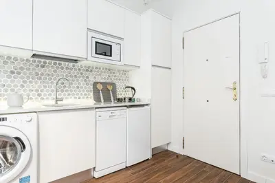Una cocina o zona de cocina en Waou CALLAO es MIA - Corta Duración