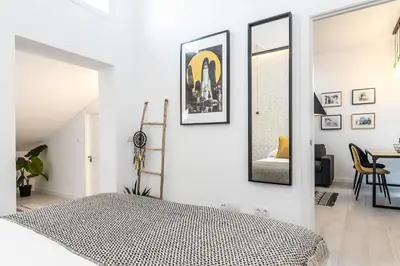 Cama o camas de una habitación en Waou MALASAÑA es MIA - Corta Duración