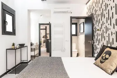 Cama o camas de una habitación en Waou MALASAÑA es MIA - Corta Duración