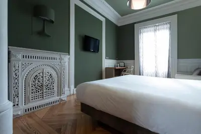 Cama o camas de una habitación en Petit Palace Lealtad Plaza