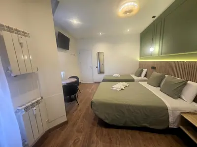 Cama o camas de una habitación en Hostal Main Street Madrid