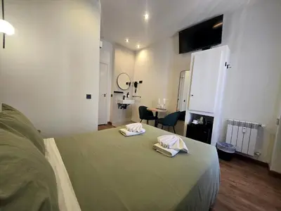 Cama o camas de una habitación en Hostal Main Street Madrid