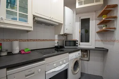 Una cocina o zona de cocina en Acogedor Apartamento Lavapies