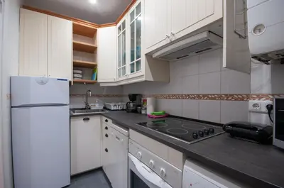 Una cocina o zona de cocina en Acogedor Apartamento Lavapies