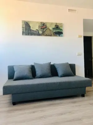 Zona de estar de Pisos con piscina de temporada corta estancia