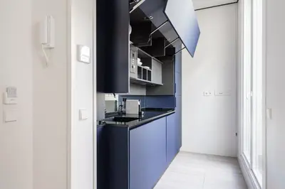 Una cocina o zona de cocina en Smartrental Collection Gran Vía Centric
