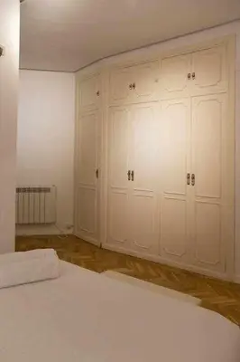 Cama o camas de una habitación en Un elegante piso para descubrir Madrid