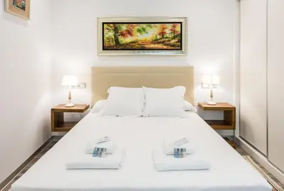 Cama o camas de una habitación en PUERTA DEL SOL CITY CENTER IV C