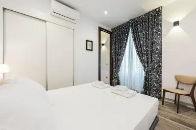 Cama o camas de una habitación en PUERTA DEL SOL CITY CENTER IV C