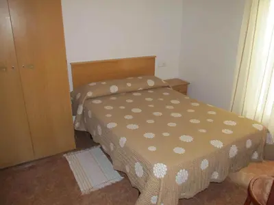Cama o camas de una habitación en Hostal Las Torres