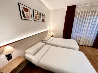 Cama o camas de una habitación en Far Home Gran Vía