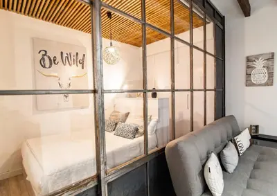 Cama o camas de una habitación en Cozy and modern apartment for 4 in Madrid