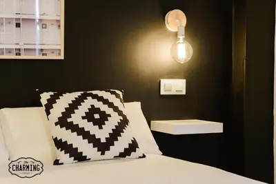 Cama o camas de una habitación en Puerta de Toledo - Alojamiento para 4 personas