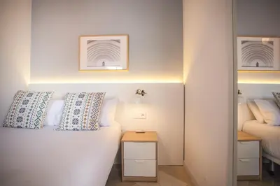 Cama o camas de una habitación en Gran Central Suites