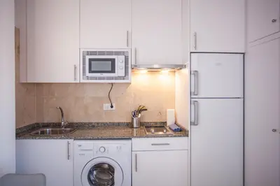 Una cocina o zona de cocina en Gran Central Suites