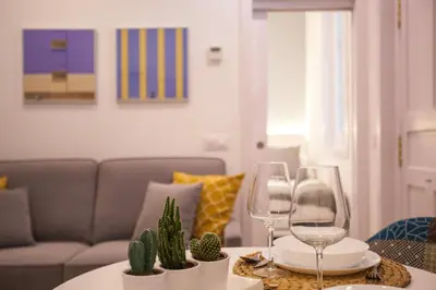 Zona de estar de Gran Central Suites