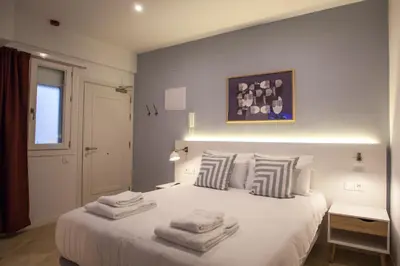 Cama o camas de una habitación en Gran Central Suites
