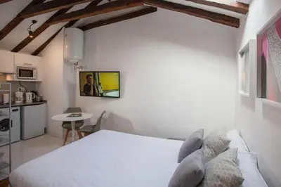 Cama o camas de una habitación en Gran Central Suites