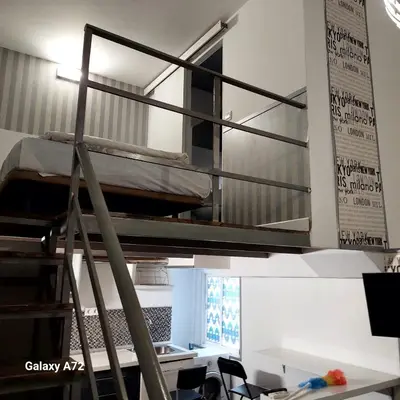Una televisión o centro de entretenimiento en Aparsol Apartments