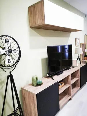 Una televisión o centro de entretenimiento en Your comfy stay in the Center of Madrid