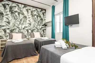 Cama o camas de una habitación en Waou Madrid Centro III - Alquiler Corta Duración
